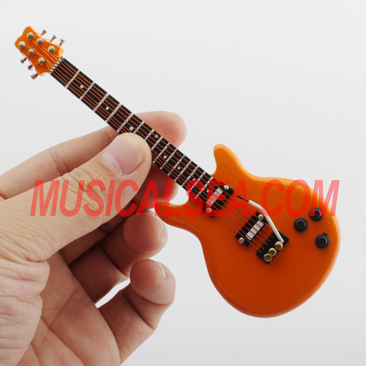 Miniature wood guitar ornament that different